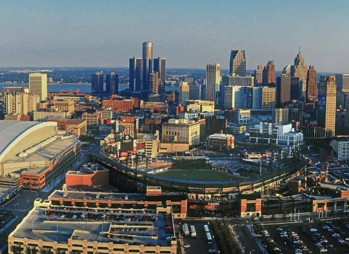 An aerial view of the ballpark and skyscrapers in downtown Detroit