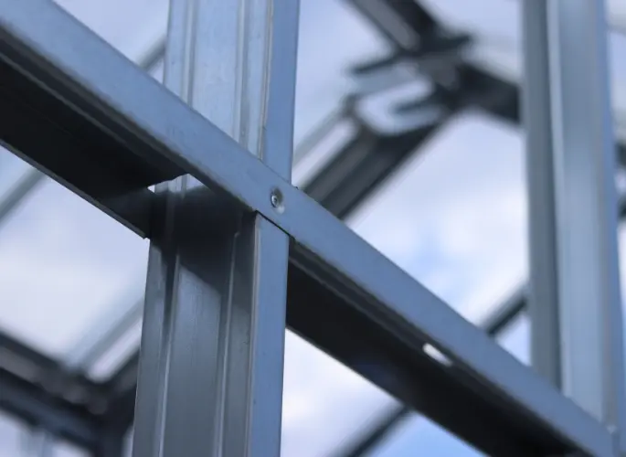 Two metal beams joined together