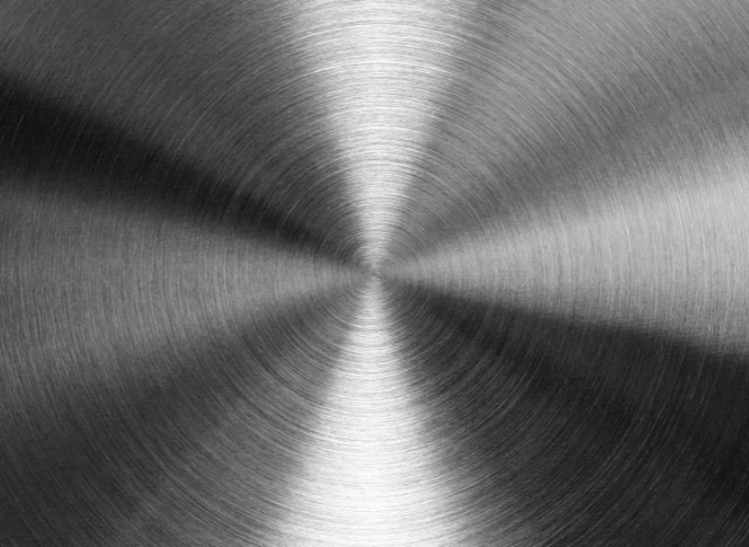 A stainless finish on a sheet of metal