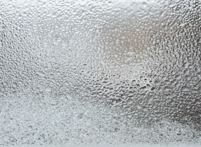 An embossed sheet of aluminum with a stucco pattern